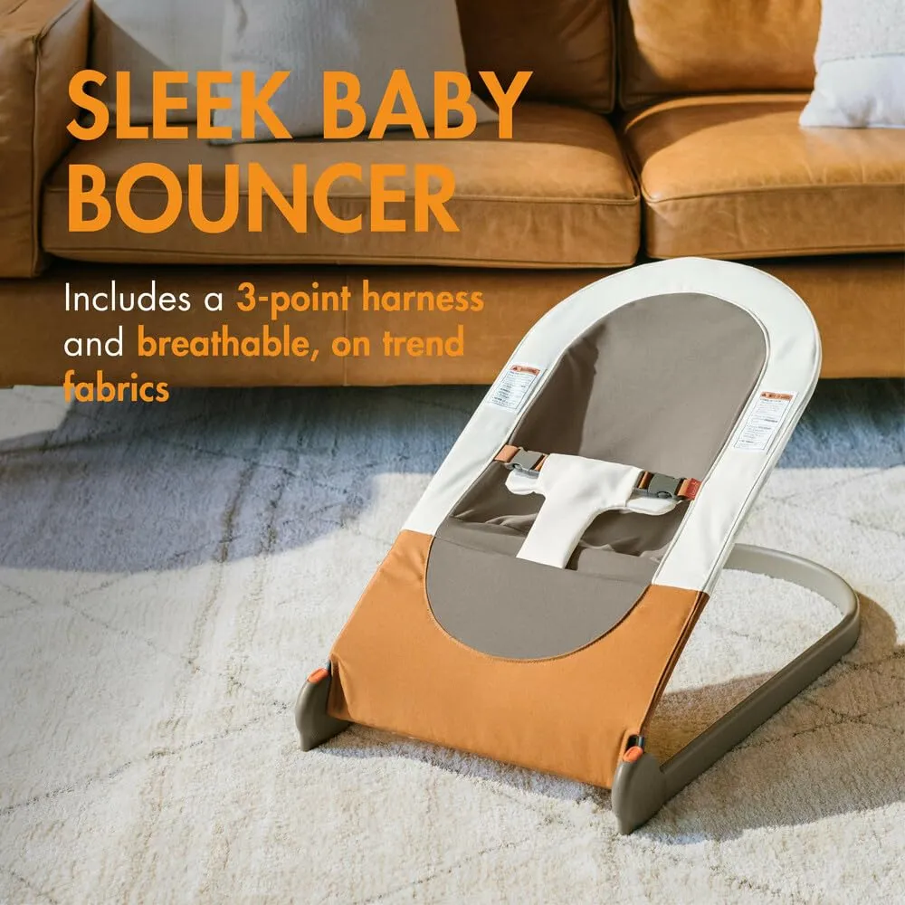 Boon Slant Portable Baby Bouncer - Folding Baby Seat for Infants - Lightweight Portable Baby Chair with Machine Washable Fabric and 3-Point Harness - Tan