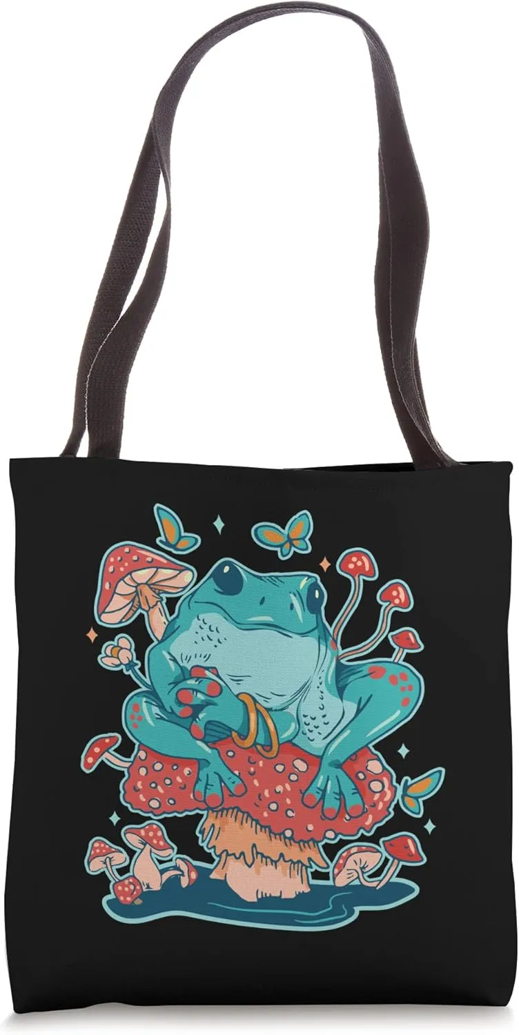 Contented Frog sitting on a mushroom Graphic Tote Bag
