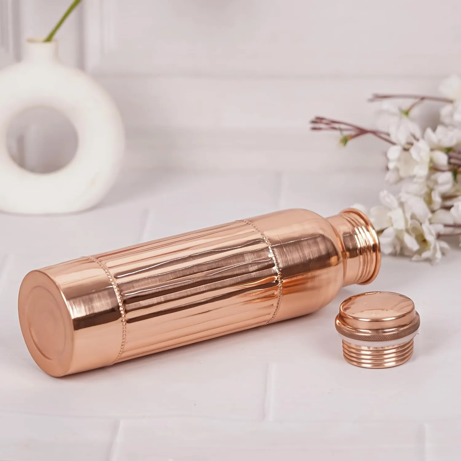 Copper Water Bottle 1000 ml Pure Copper Bottles with Carry Bag For Sports, Yoga, Ayurvedic Vessels for Gym,Office,Hiking (Pack of 1, Natural Lining Bottle)