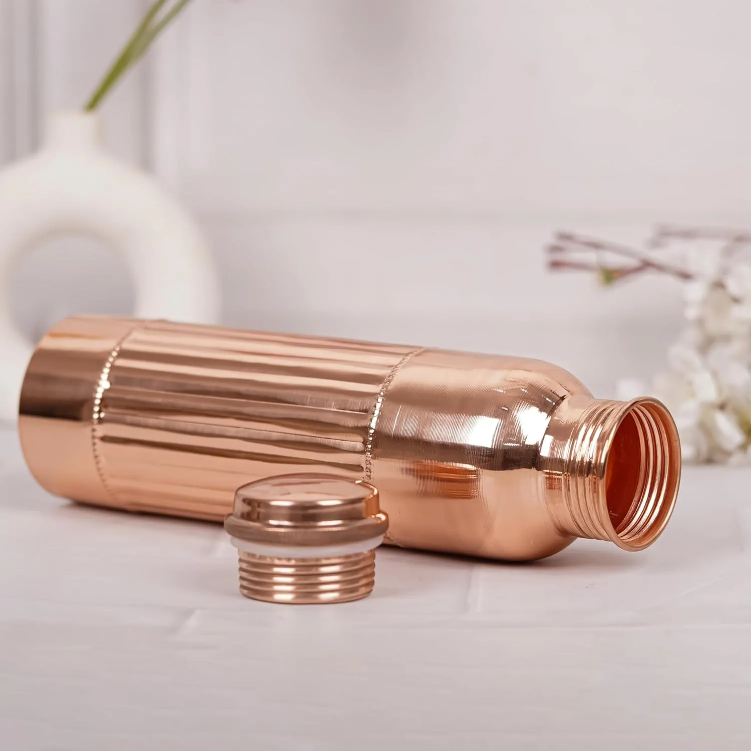 Copper Water Bottle 1000 ml Pure Copper Bottles with Carry Bag For Sports, Yoga, Ayurvedic Vessels for Gym,Office,Hiking (Pack of 1, Natural Lining Bottle)