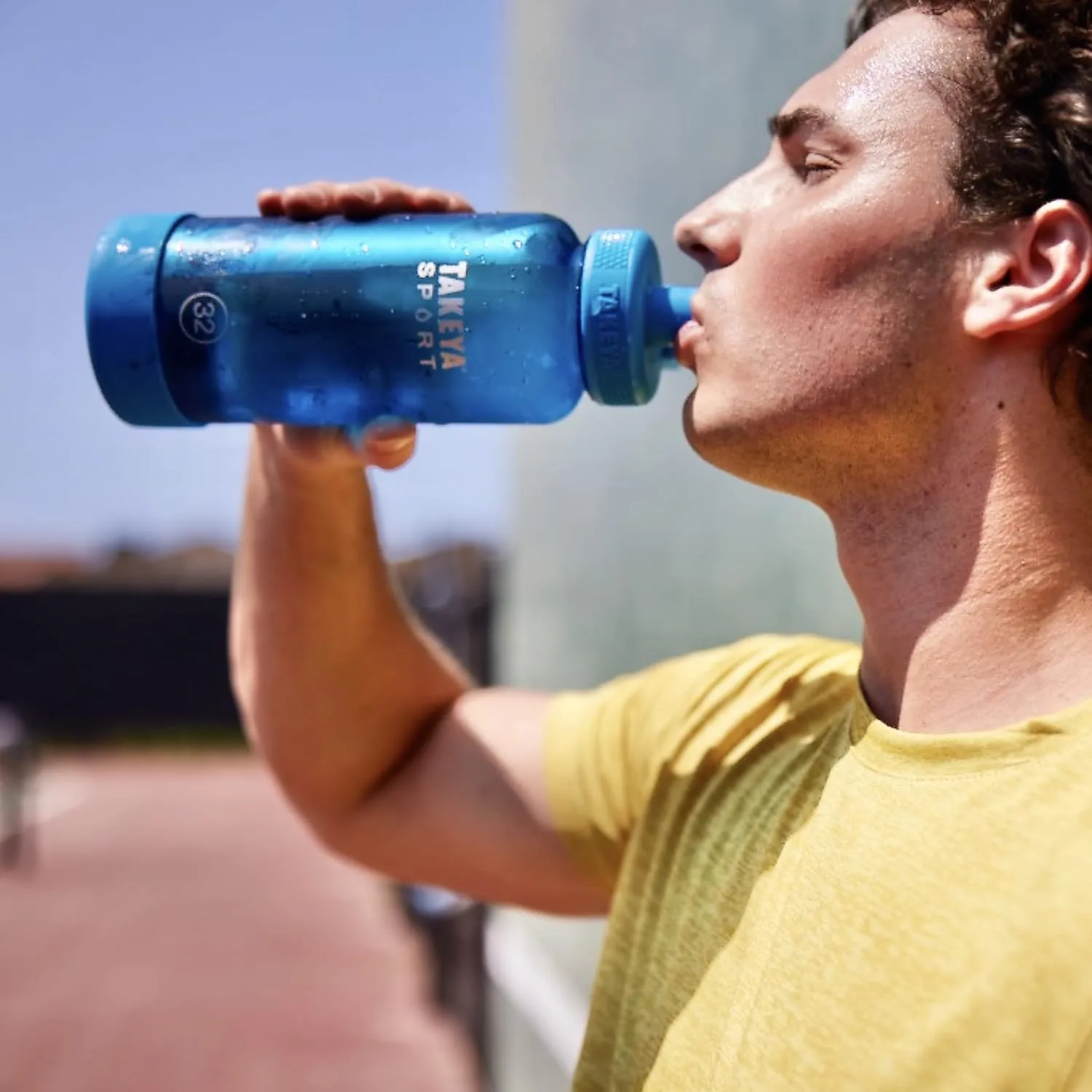 Takeya Tritan Sport Water Bottle with Spout Lid - BPA-Free & Dishwasher-Safe Water Bottle - Reusable Bottle with Lid Handle - Simple Leak-Proof Water Bottle - 32 oz, Grand Slam Black